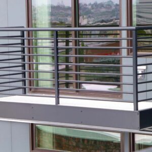 Horizontal railing on apartment unit balcony