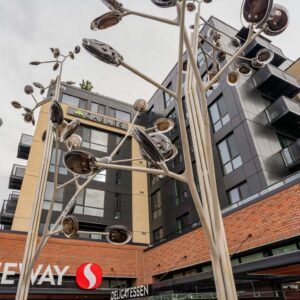 Glass railing on balconies of multifamily apartment complex