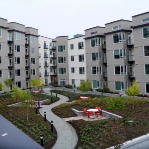 Framed glass railings on multifamily complex
